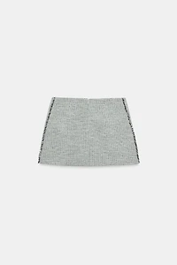 TEXTURED FRAYED MINI SKIRT