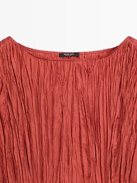 Robe longue plissée satinée