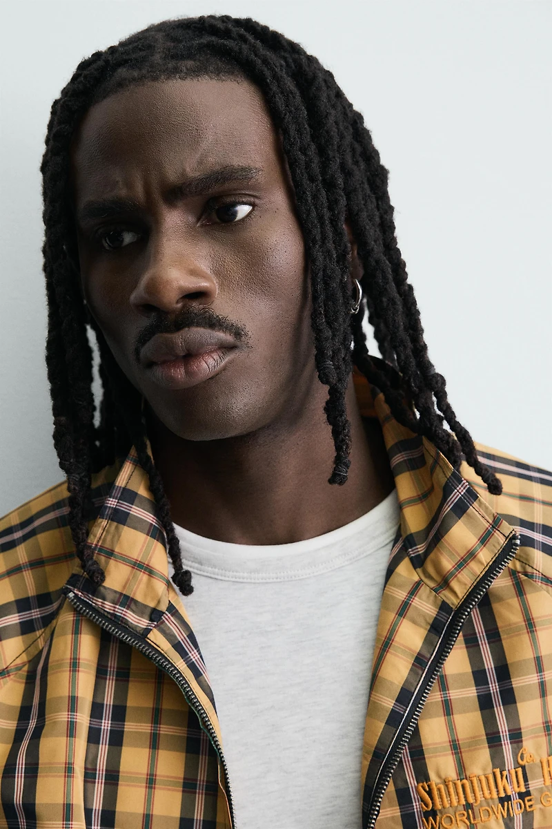 BOXY FIT PLAID TECHNICAL JACKET