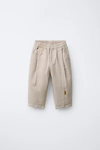 PANTALON BALLOON PLIS ÉTIQUETTES