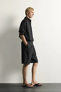 STRIPED PLEATED RELAXED FIT SHORTS