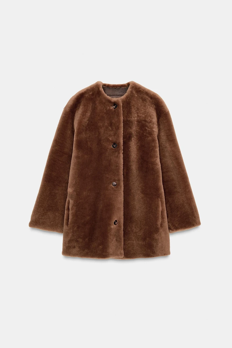 MANTEAU 100 % CUIR RÉVERSIBLE