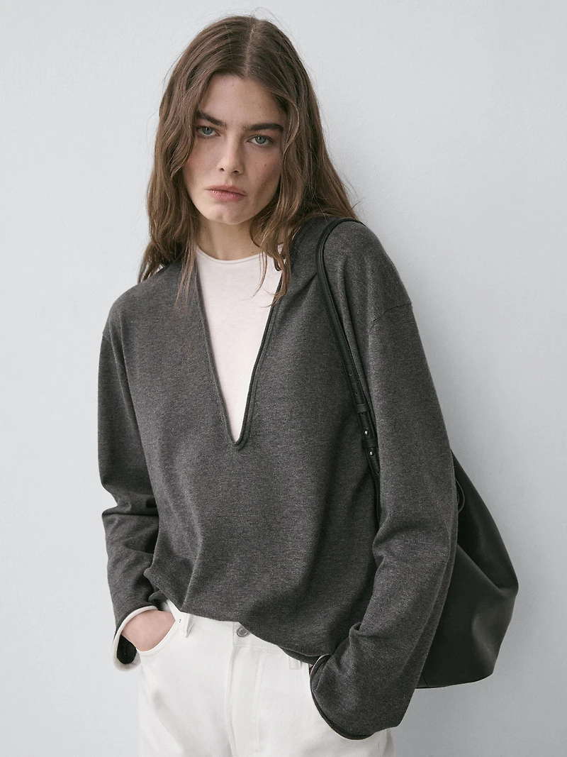 Cotton blend knit sweater with contrast fabric