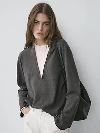 Cotton blend knit sweater with contrast fabric