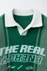 PULL POLO EN MAILLE EFFET FOURRURE AVEC INSCRIPTION