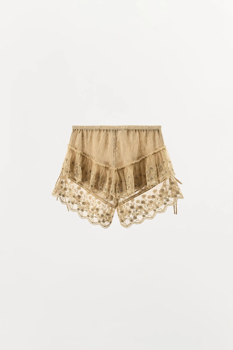 EMBROIDERED RUFFLE SHORTS