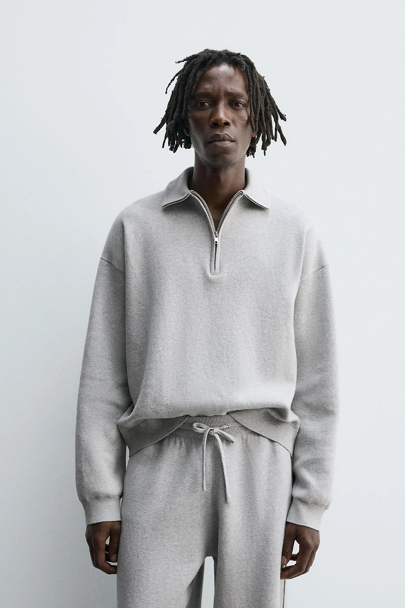 POLO EN MAILLE À COL ZIPPÉ