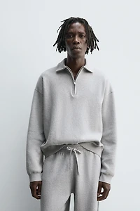POLO EN MAILLE À COL ZIPPÉ