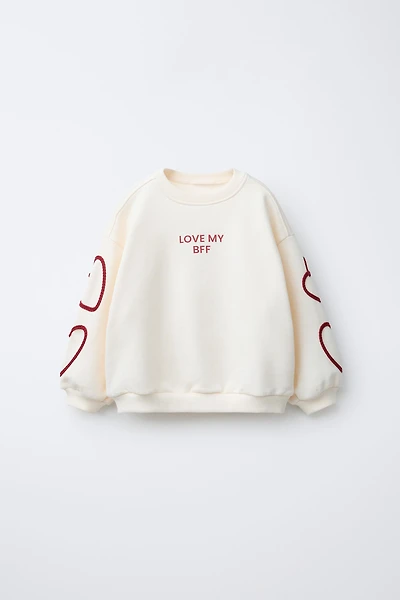 TEXT HEARTS SWEATSHIRT