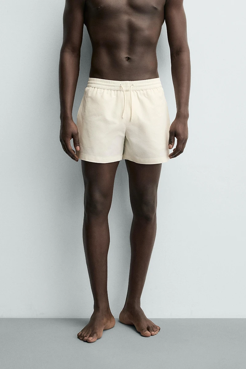 SEERSUCKER SWIM TRUNKS