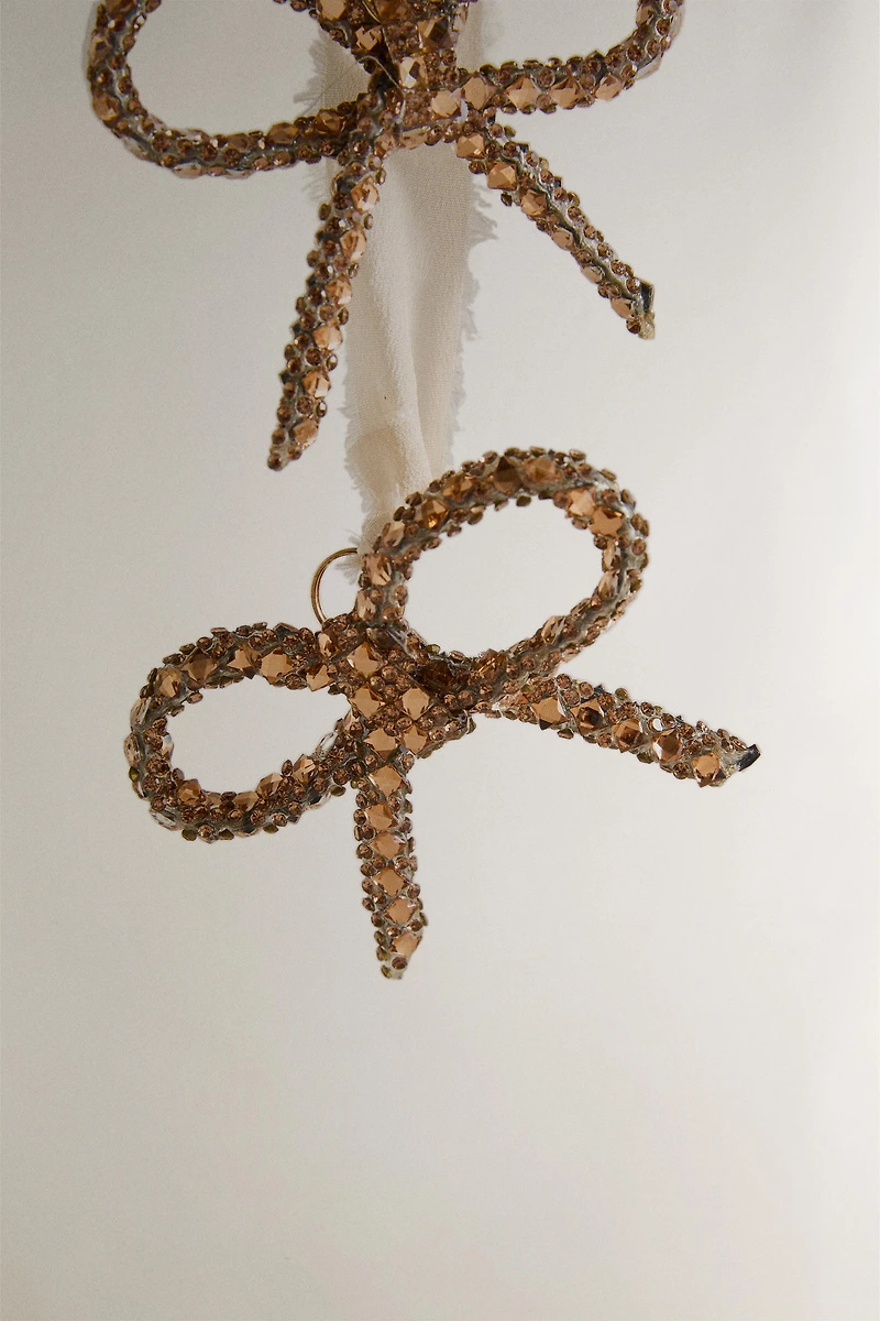 GLITTERY BOW CASCADE CHRISTMAS ORNAMENT