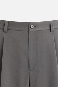 PLEATED RELAXED FIT SHORTS