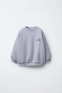 HEART POCKET SWEATSHIRT
