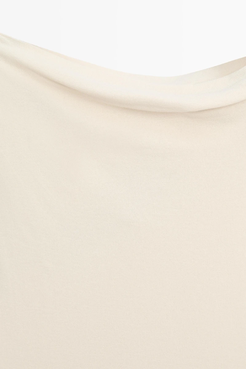 Asymmetric drop sleeve top