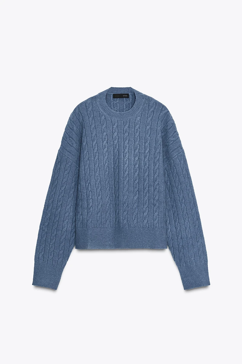PULL EN MAILLE À TORSADES
