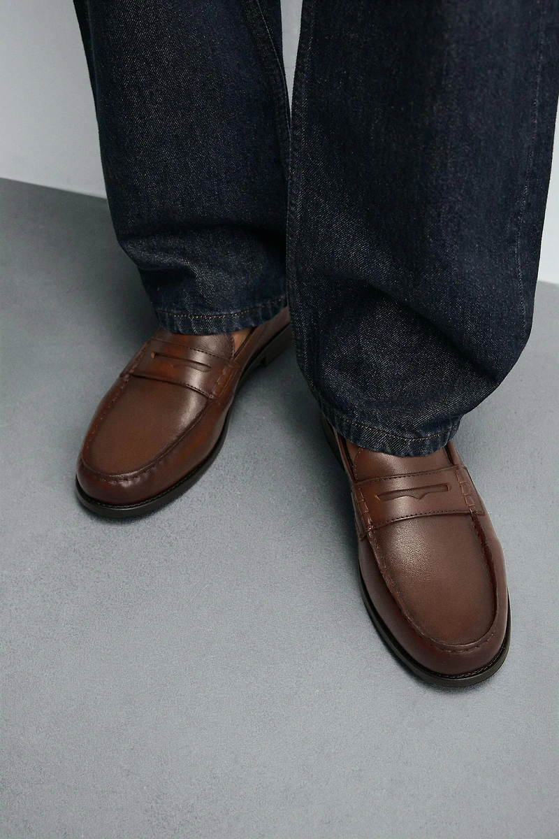 MOCASSINS EN CUIR À MASQUE