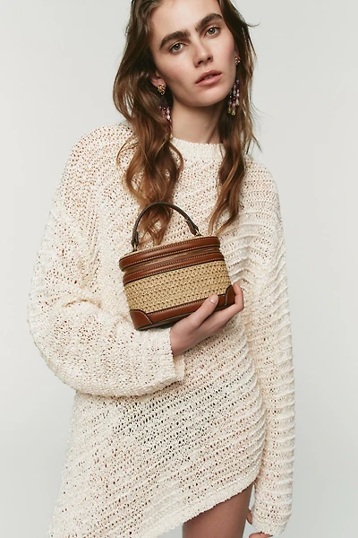 WOVEN VANITY BAG