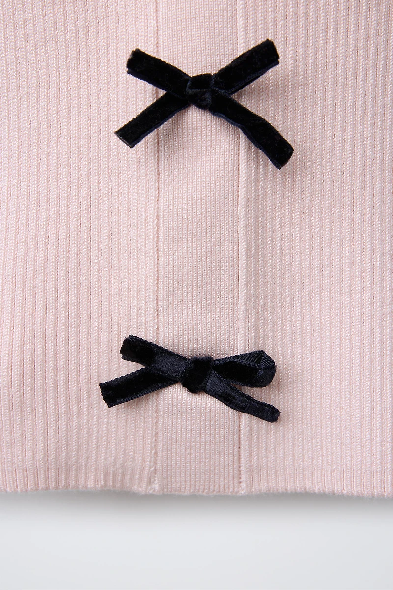 GILET EN MAILLE À NŒUDS