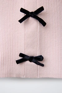 GILET EN MAILLE À NŒUDS