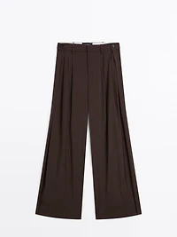 Flowing trousers with darts