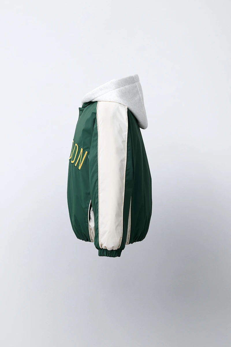 BLOUSON BOMBER CAPUCHE EN MOLLETON AMOVIBLE DÉPERLANT