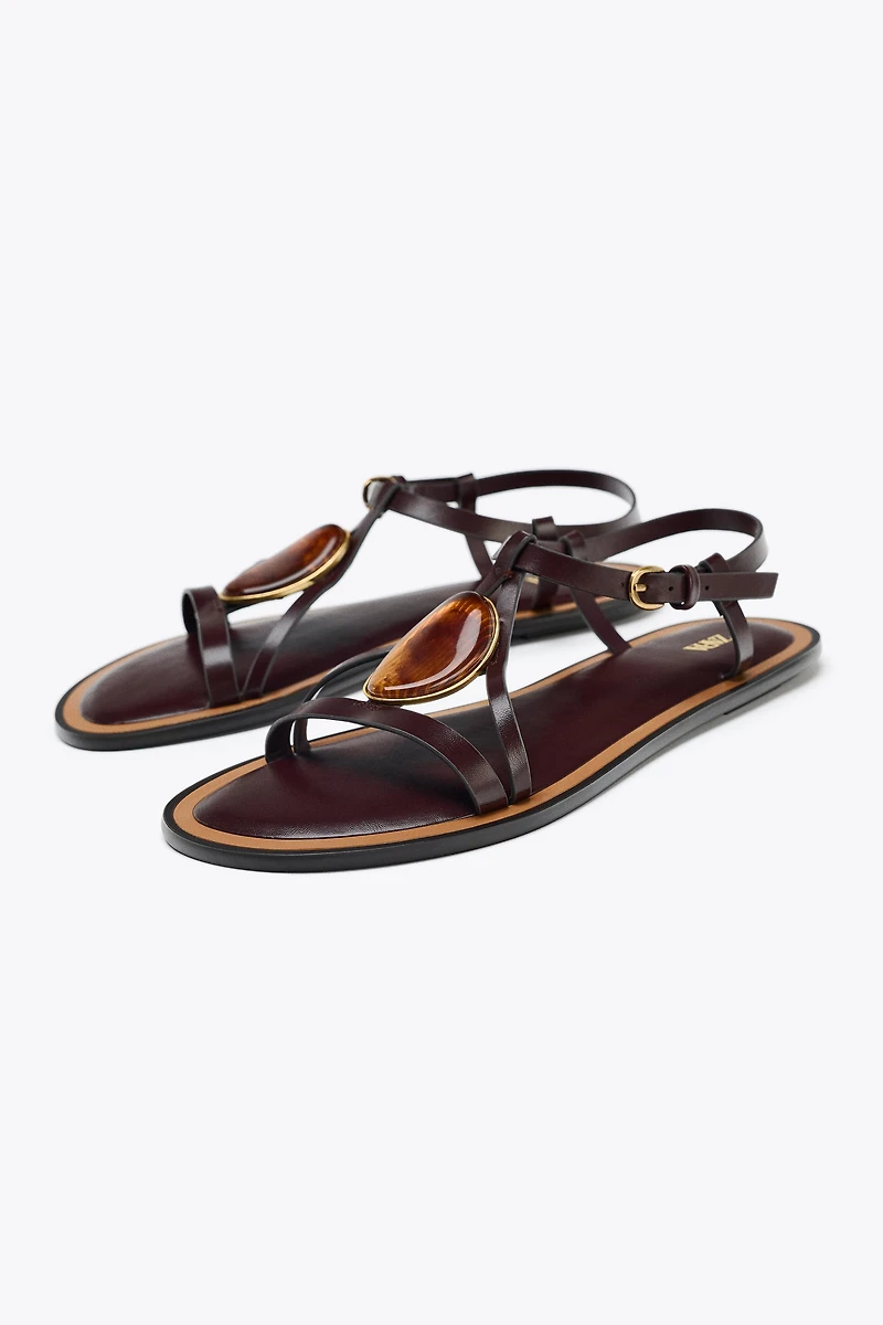 SANDALS WITH METALLIC APPLIQUÉ