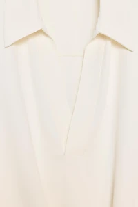 CHEMISE À PLIS ET BAS ASYMÉTRIQUE