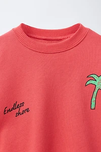SWEAT IMPRIMÉ PALMIER
