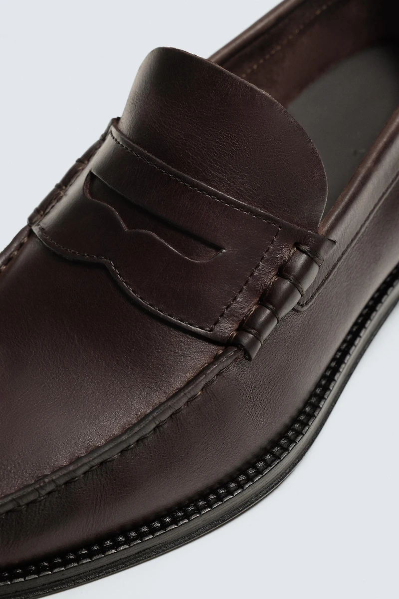 MOCASSINS EN CUIR À MASQUE