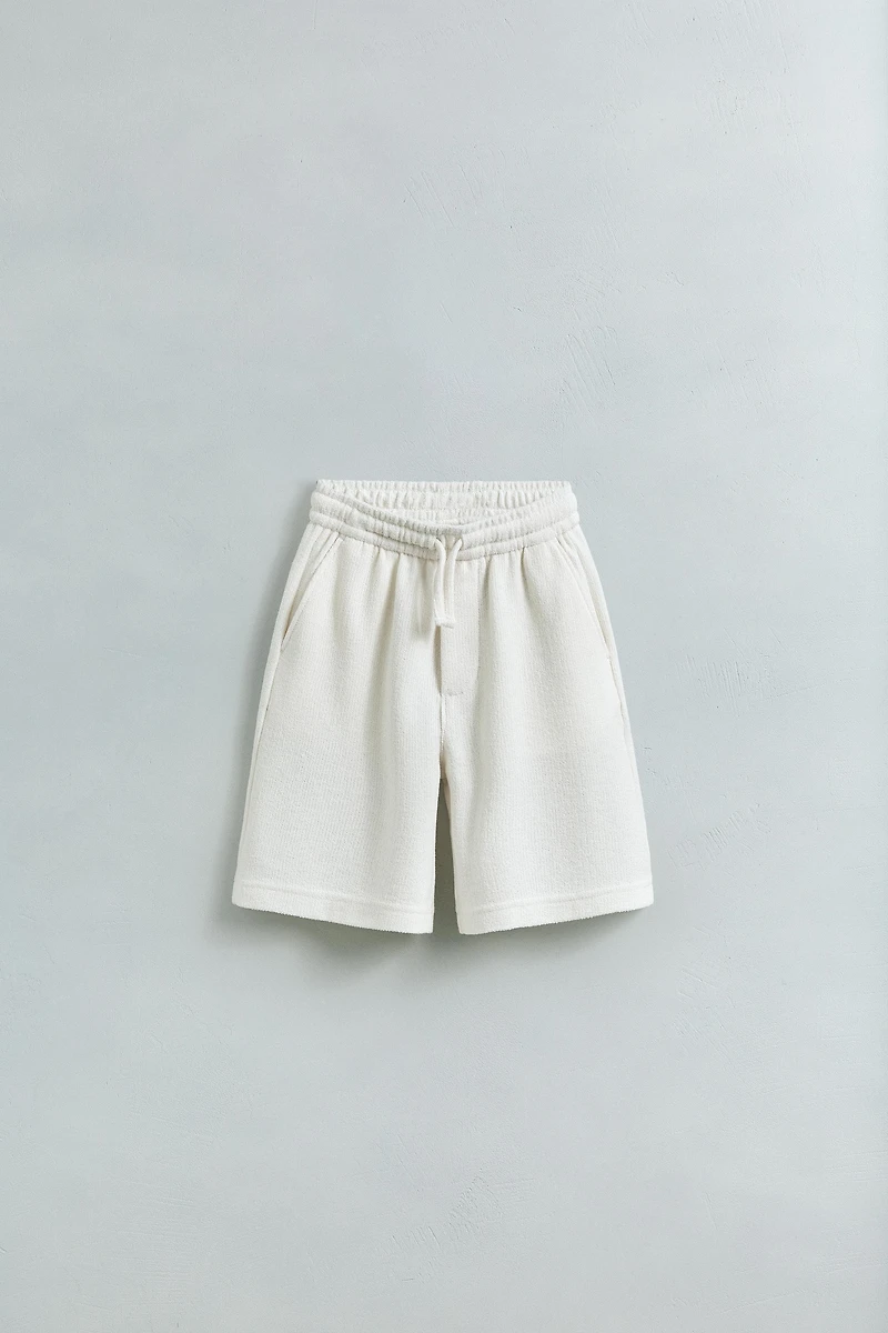 SLIM FIT TEXTURED TOWEL SHORTS