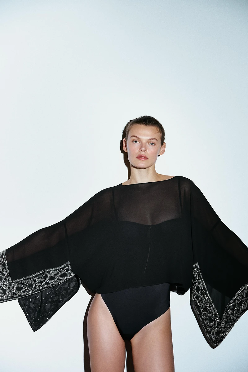 BEADED SEMI-SHEER BATWING CAPE