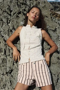EMBROIDERED EYELET TOP WITH FROG FASTENING