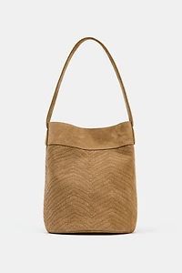 SAC MAXI SEAU EN CROÛTE DE CUIR TRESSÉE