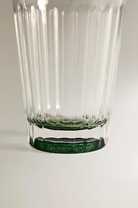 RAISED GLASS TUMBLER WITH A COLORED BASE