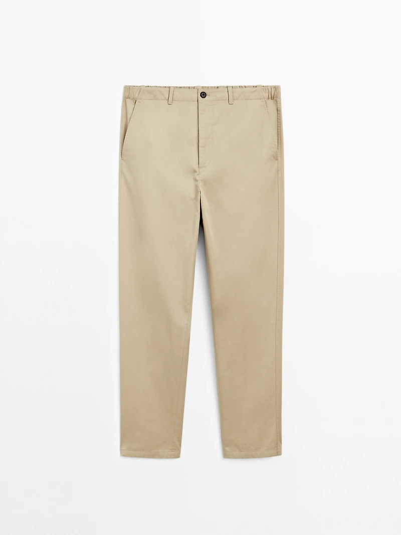 Trousers with patch pocket