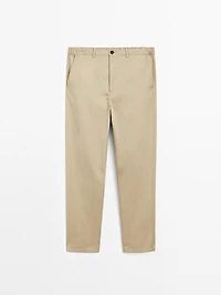 Trousers with patch pocket