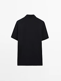 Polo à manches courtes et patte pressionnée