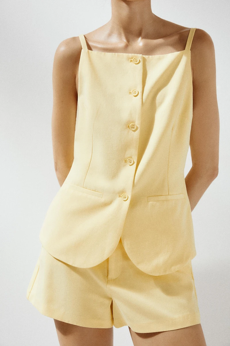 TOP GILET À BOUTONS