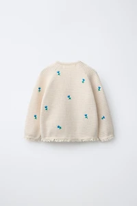 GILET EN MAILLE TEXTURÉE À FLEURS BRODÉES ET DENTELLE
