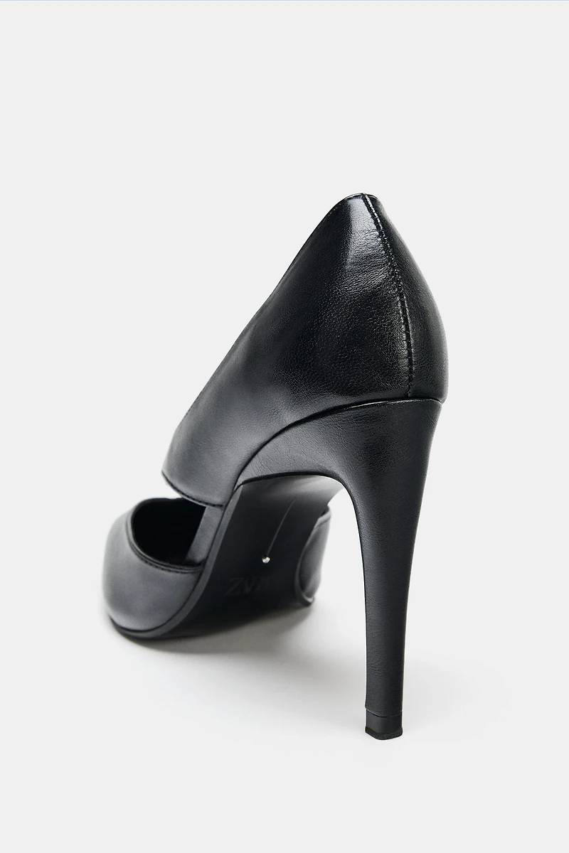 ASYMMETRICAL HEELS