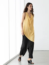 Top long fluide asymétrique