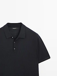 Polo en maille de laine mélangée à manches courtes
