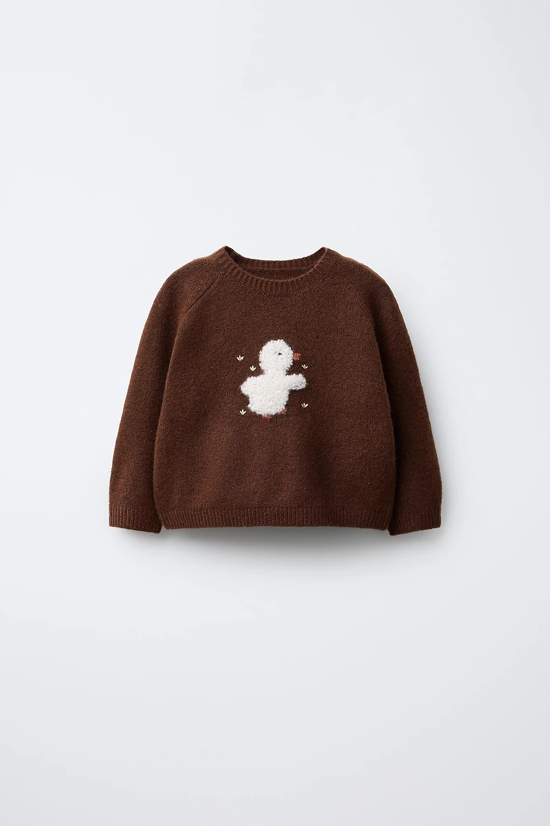PULL EN MAILLE AVEC CANARD BRODÉ