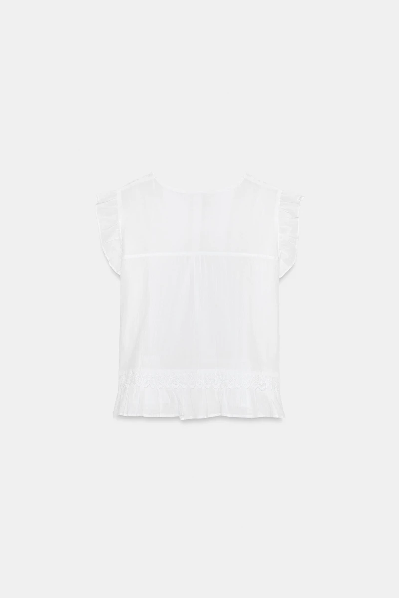 BLOUSE ENTRE-DEUX ET VOLANTS