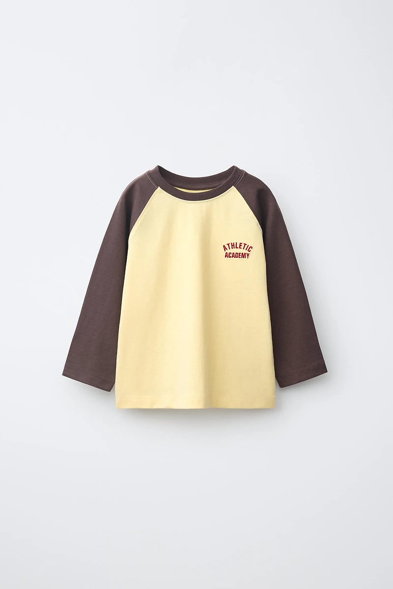 EMBROIDERED TEXT RAGLAN SLEEVE T-SHIRT
