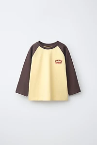 EMBROIDERED TEXT RAGLAN SLEEVE T-SHIRT