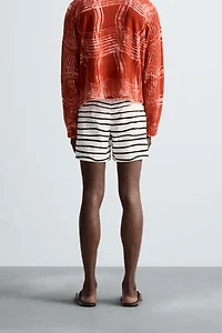 OTIS KWAME KYE QUAICOE PRINTED MID-LENGTH SWIMSUIT