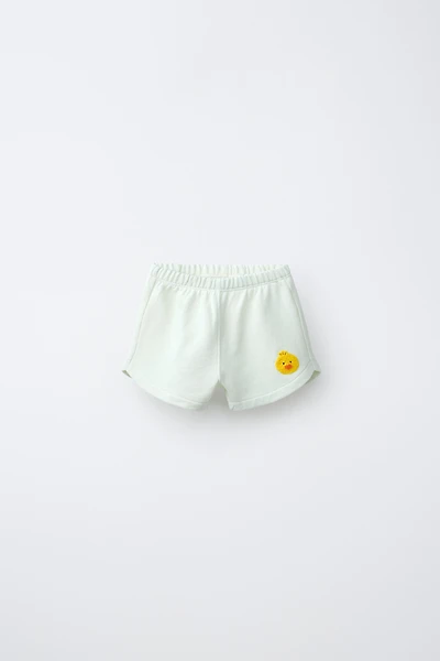 SHORT POUSSIN BRODÉ EN VELOURS BOUCLÉ