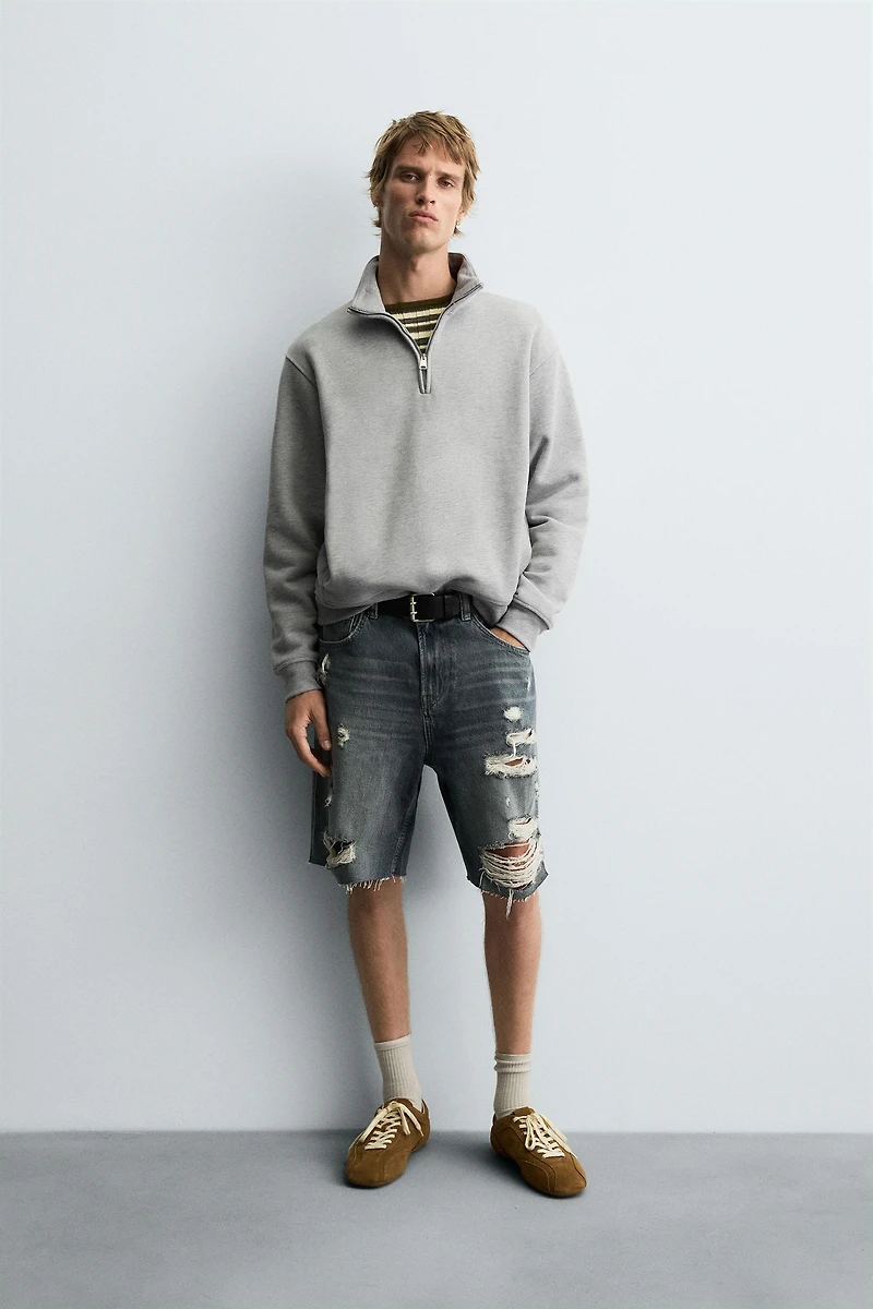 BERMUDA EN DENIM DÉCHIRÉ