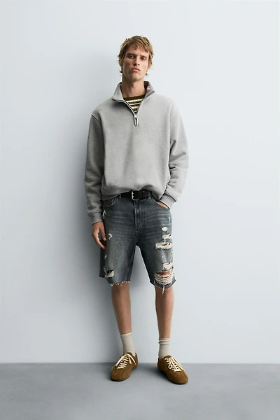 BERMUDA EN DENIM DÉCHIRÉ